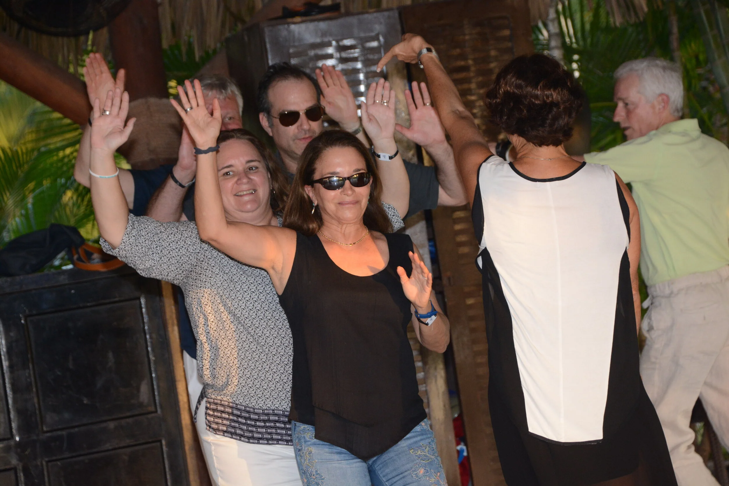Team members dancing during leadership training